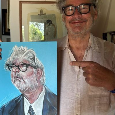 Paolo Del Debbio con la caricatura pubblicata sul Fatto Quotidiano